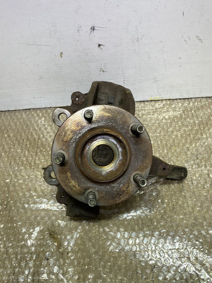 2006 Mazda Axela- Left Front Steering Knuckle PN: see photos