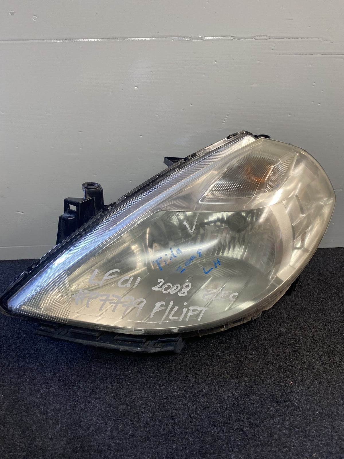 2008 Nissan Tiida - Left Headlight PN: P7779 F/Lift elec adjust