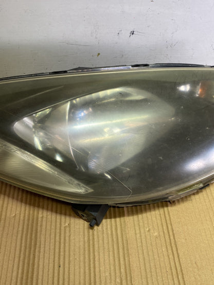 2009 Mazda Demio- Right Headlight PN: STANLEY P654/P7217