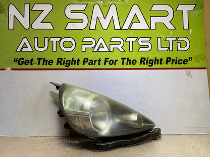 2005 Honda Fit - Right Headlight PN: see photos