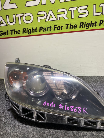 2004 Mazda Axela - Left Headlight Manual Adjust/ Non Hid/ Stanley P2951