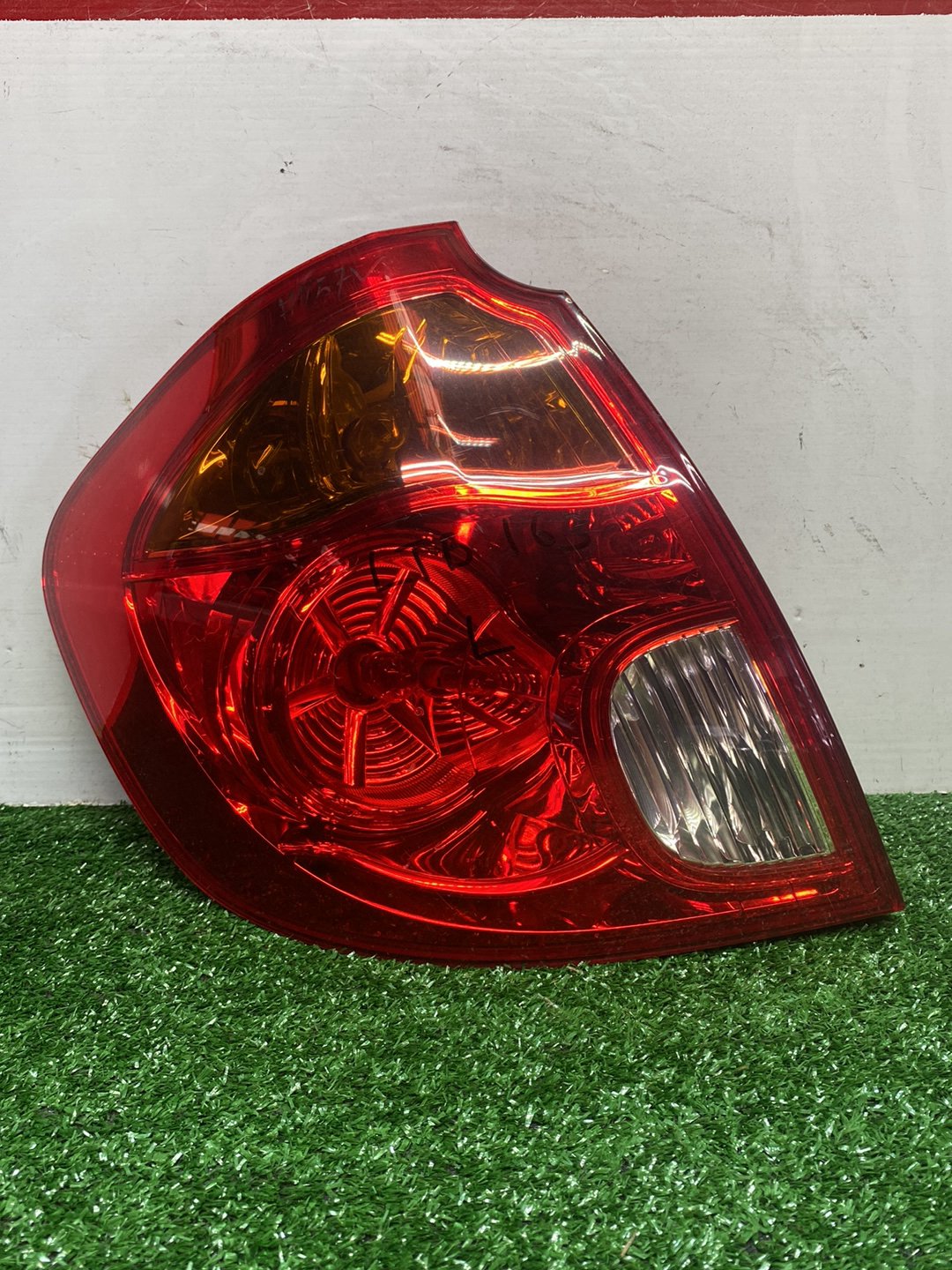 2007 Mazda Verisa - Left Taillight PN: P4417