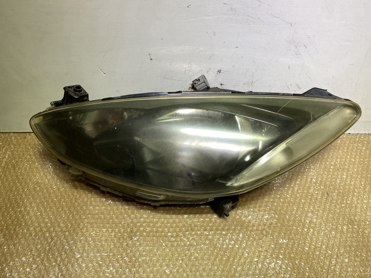 2009 Mazda Demio - Left Headlight PN: see photos