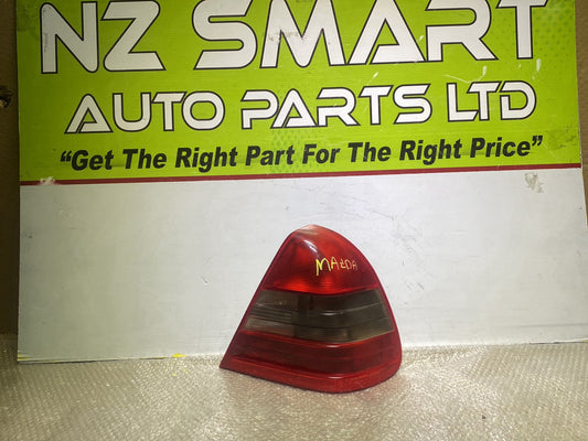 1999 Mazda C-Class- Right Taillight PN: see photos