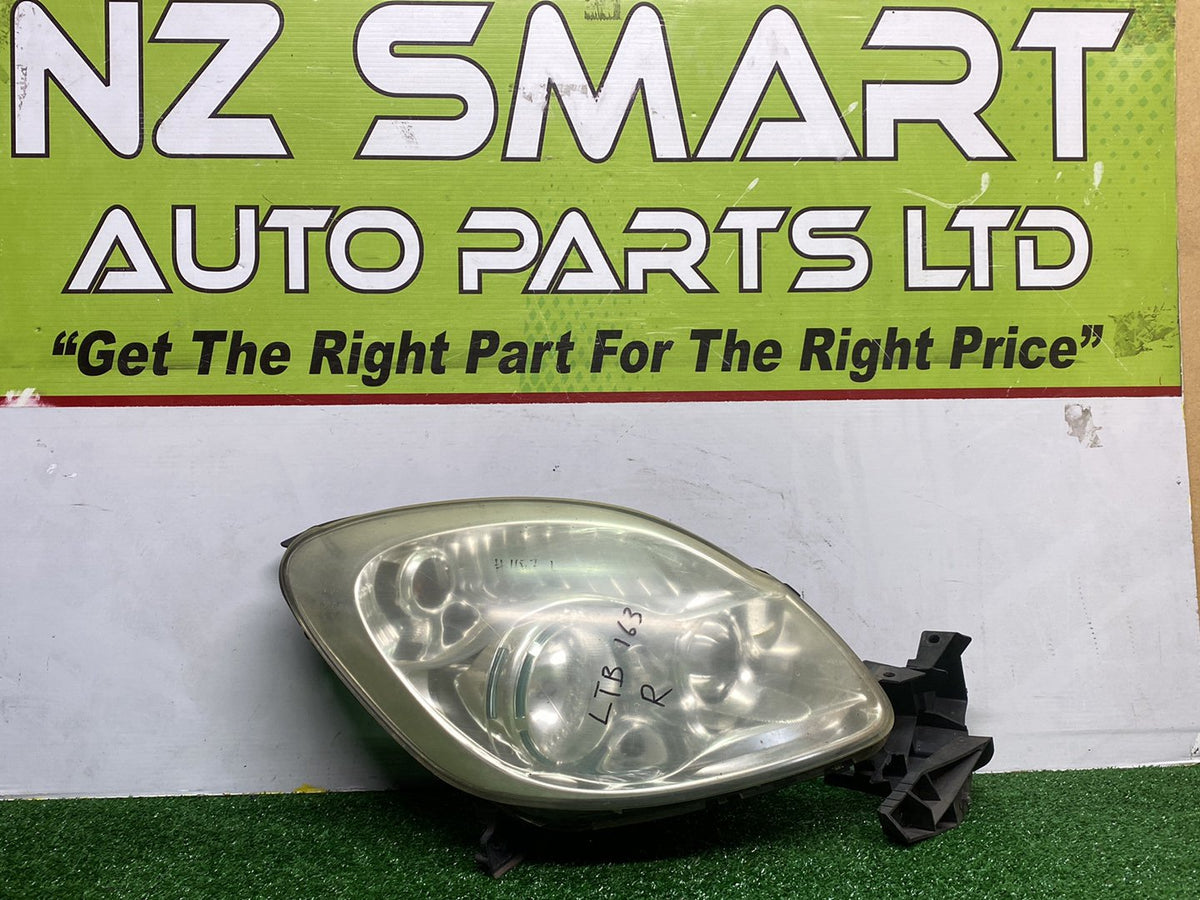 2007 Mazda Verisa - Right Headlight PN: D673510K0