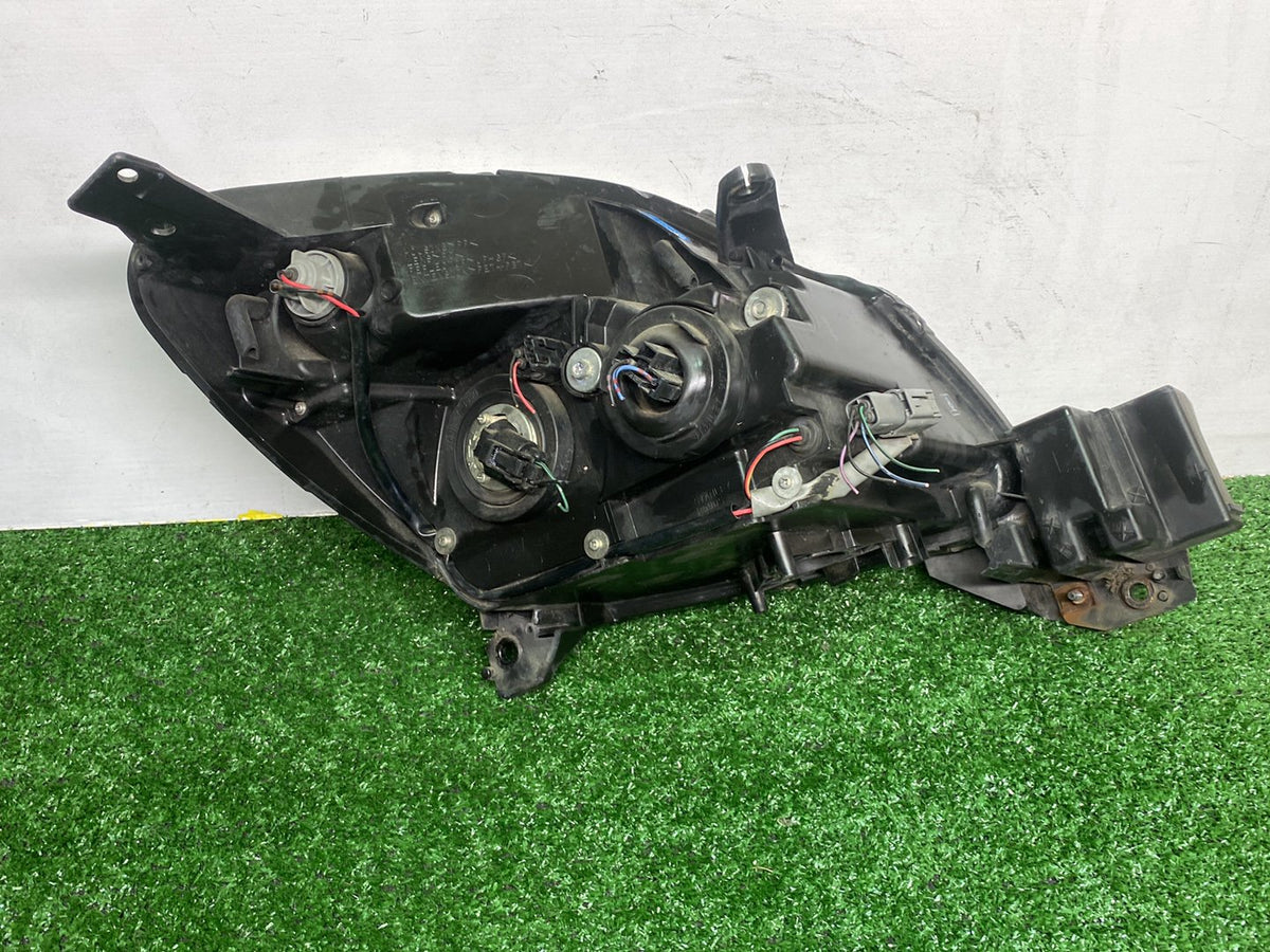 2007 Mazda Verisa - Left Headlight PN: D673510L0