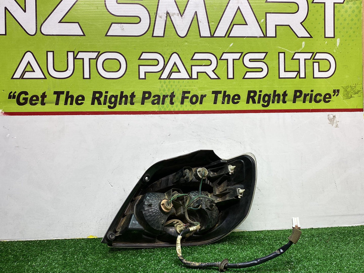 2005 Mitsubishi Airtrek - Left Taillight PN: 220-87685