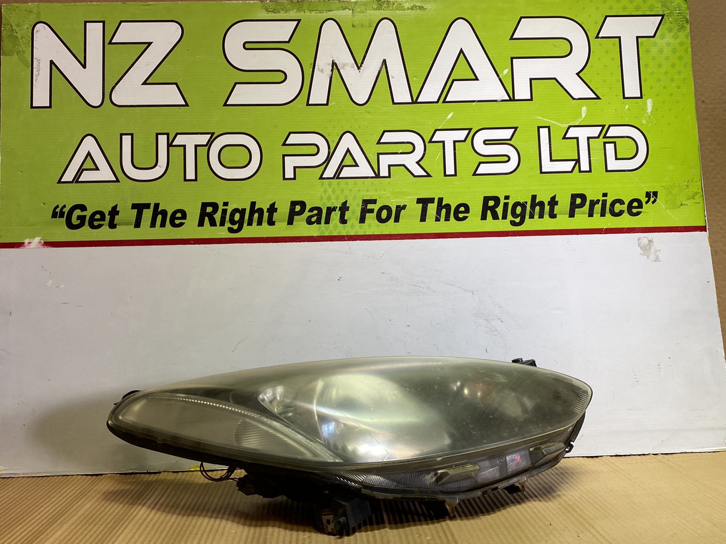 2009 Mazda Demio- Right Headlight PN: STANLEY P654/P7217