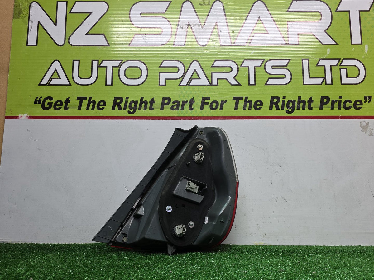 2005 Honda Fit - Left Taillight PN: 4995