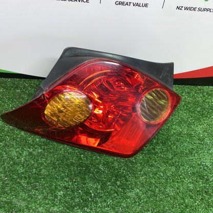 2004 Used Toyota Ist - Left Taillight PN: KOITO 52-056