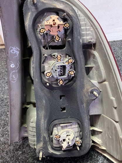 2003 Toyota Corolla - Left Taillight PN: 13-61