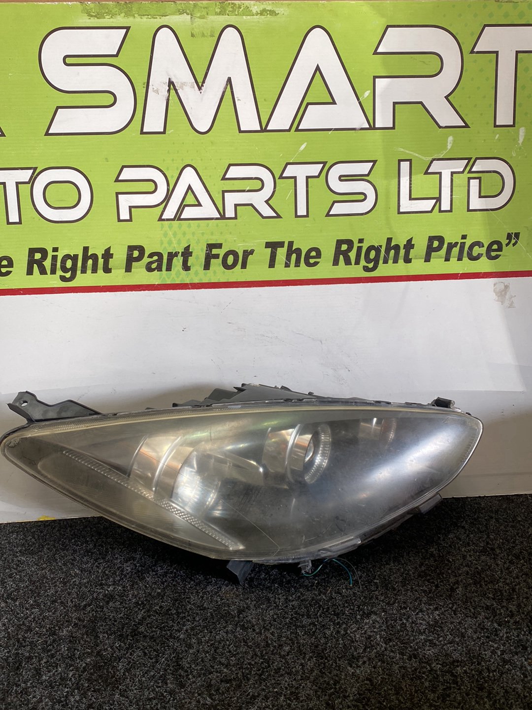 2008 Mazda Demio- Left Headlight PN:
