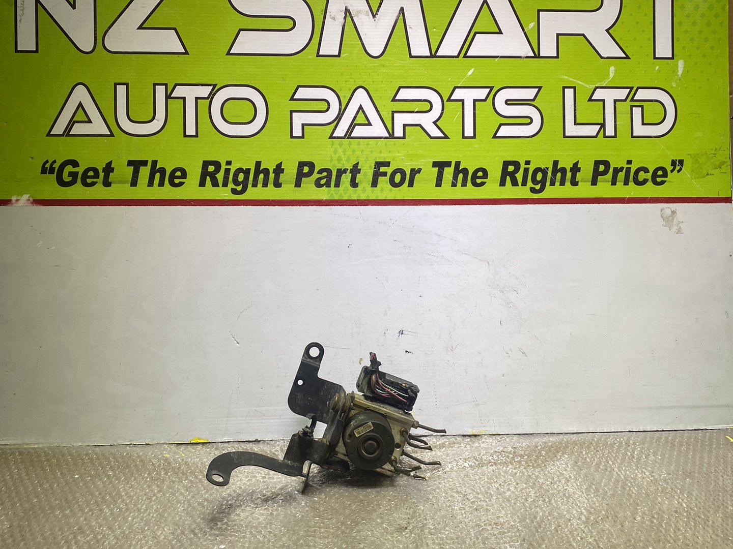 2004 Mazda Demio- ABS Pump PN: see photos