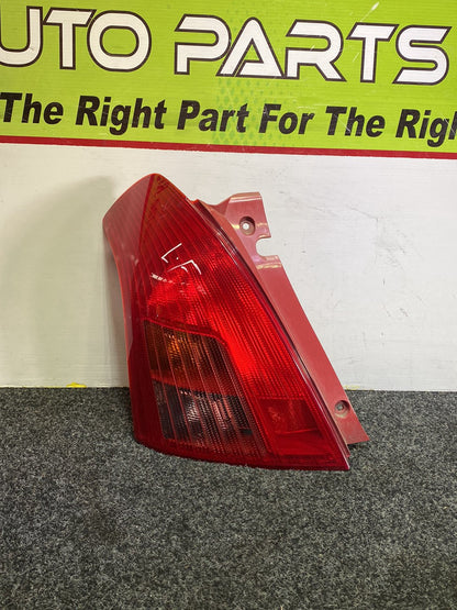 2004 Suzuki Swift - Left Taillight PN: STANLEY P4476L