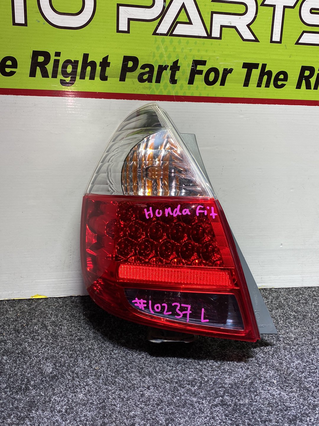 2005 Honda Fit - Left Taillight PN: ICHIKOH 4995