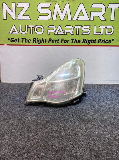 2005 Nissan Bluebird G11 - Left Headlight PN: Auto Adjust/ Non Hid/ KOITO 100-63823