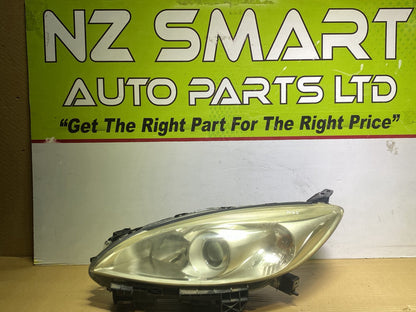 2011 Mazda Premacy CWEFW- Left Headlight PN: