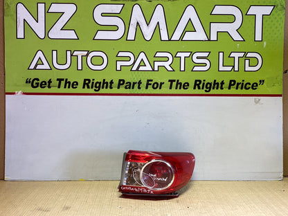 2010 Used Toyota Corolla - Right Taillight PN: Koito 12-566