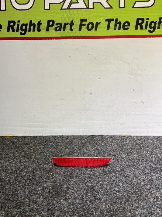 2007 Nissan Dualis - Left Rear Bumper Reflector PN: KOITO 33-14207L