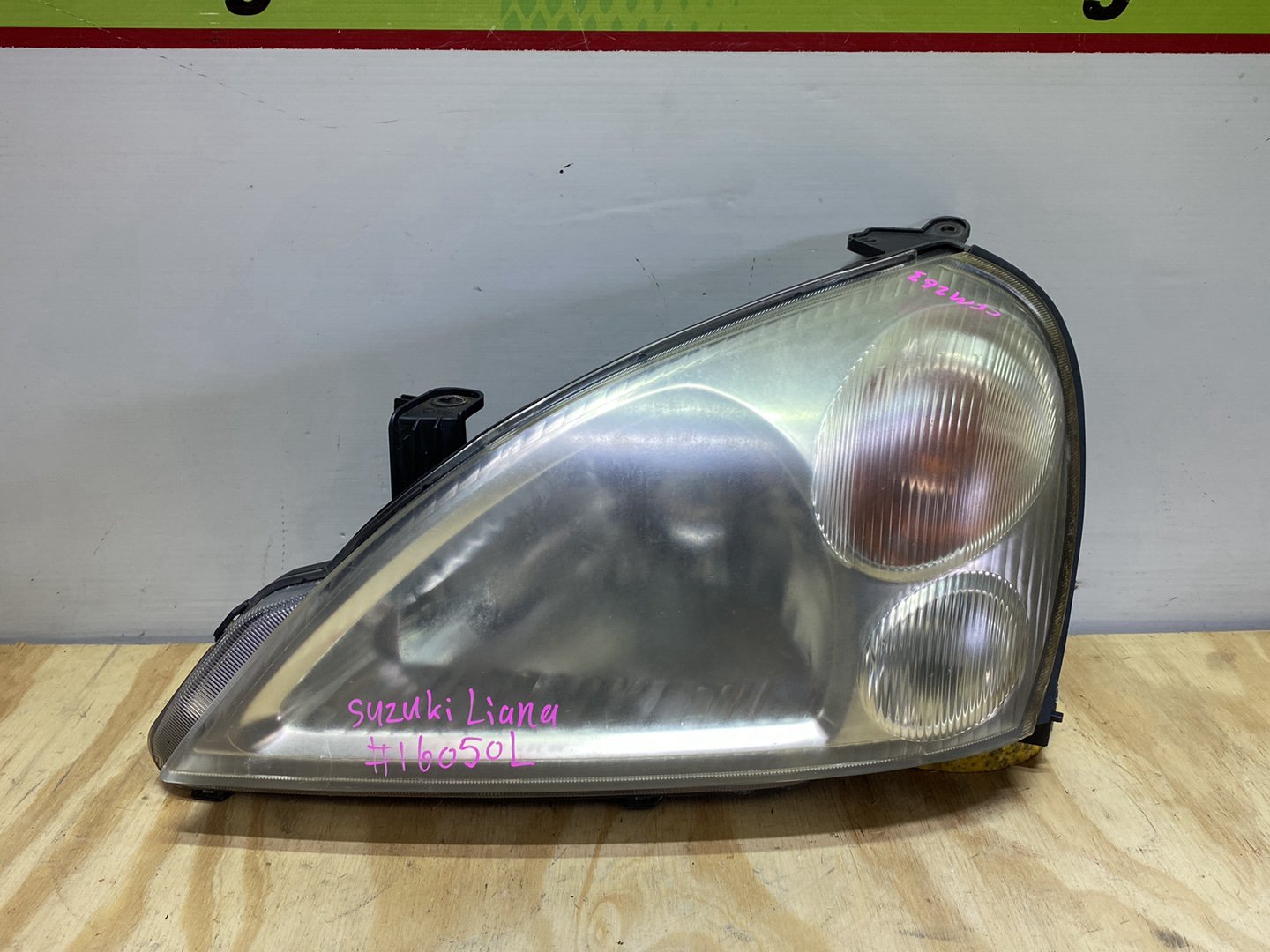2004 Suzuki Liana - Left Headlight PN: Koito 100-32662