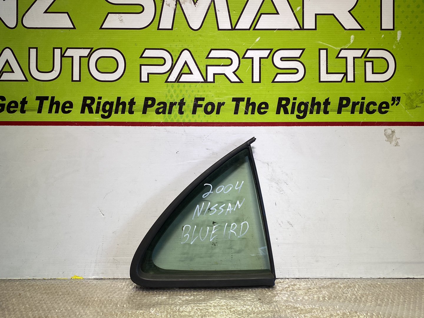 2004 Nissan Bluebird- Right Rear Quarter Door Glass PN: M2E2
