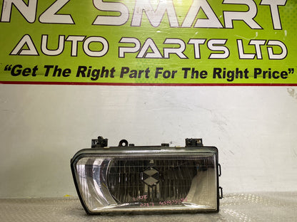 2003 Mitsubishi L300- Right Headlight PN: see photos