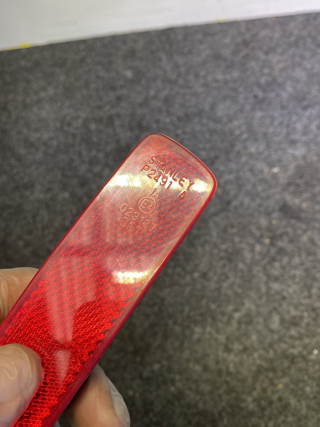 2006 Mazda Axela - Right Rear Bumper Reflector PN: STANLEY P2491 A