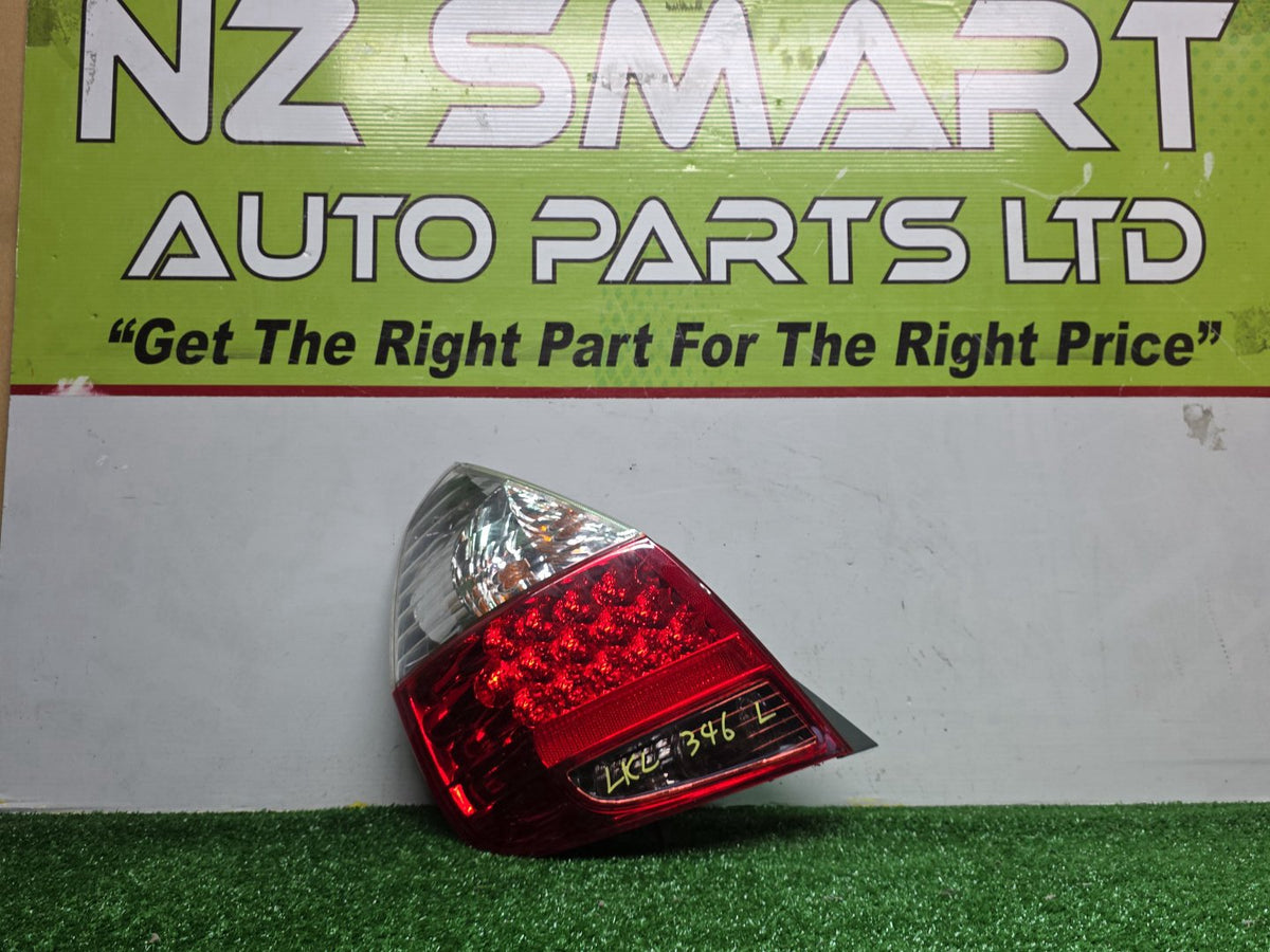 2005 Honda Fit - Left Taillight PN: 4995