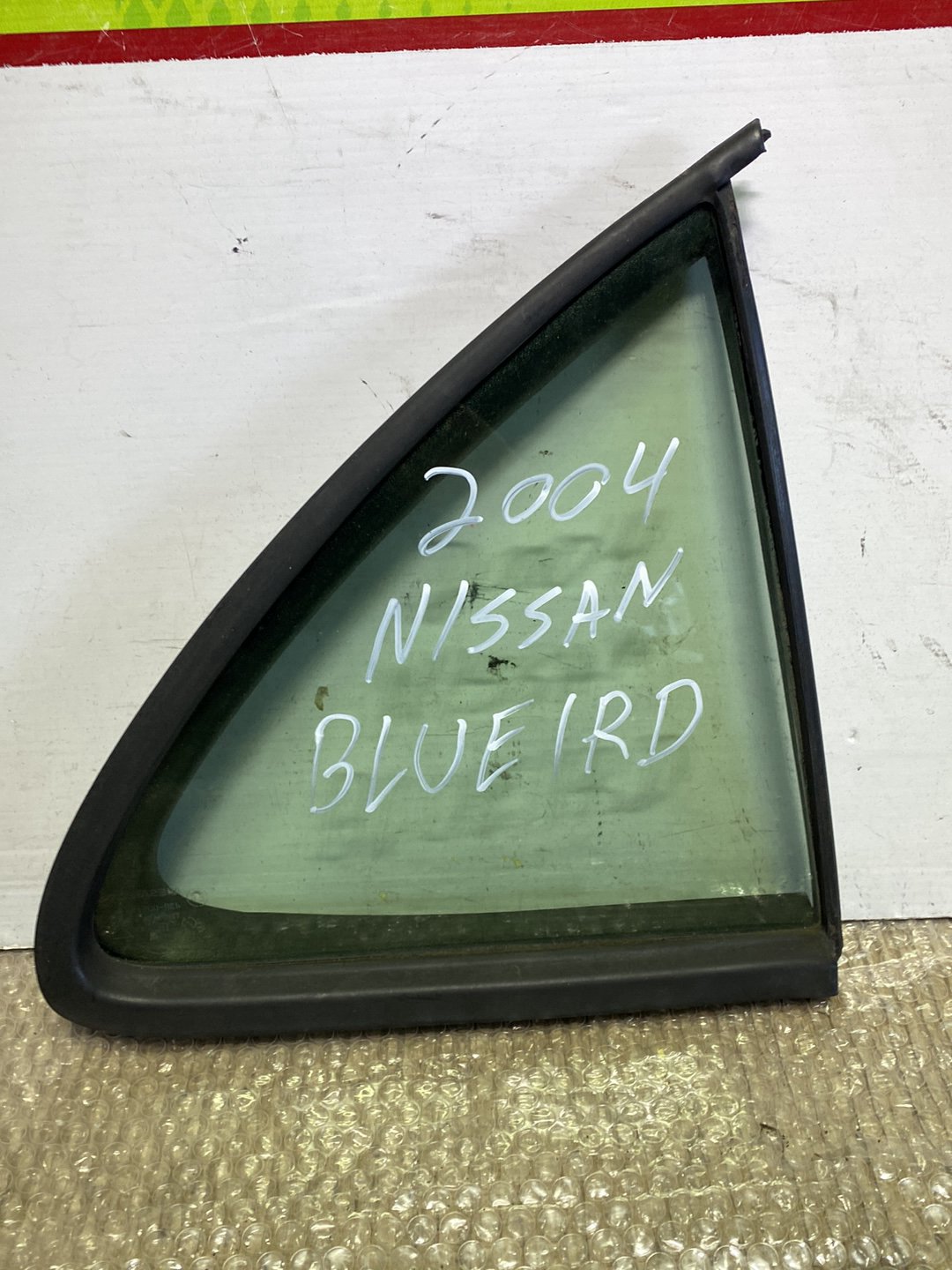 2004 Nissan Bluebird- Right Rear Quarter Door Glass PN: M2E2