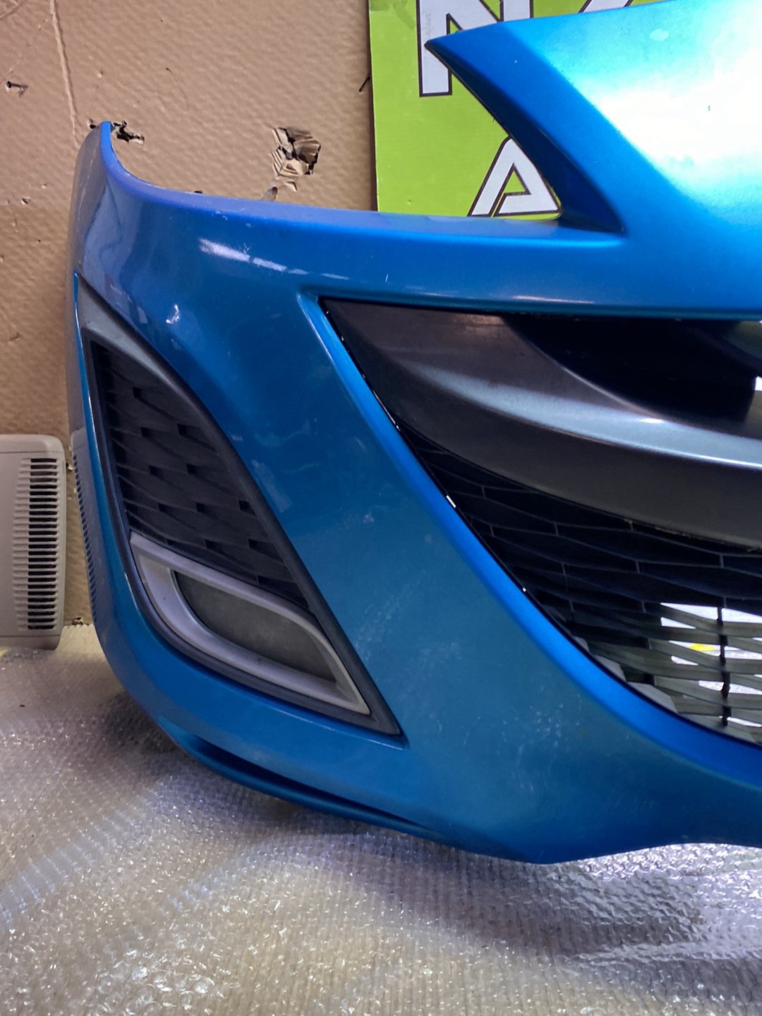 2009 Mazda Axela- Front Bumper PN: see photos