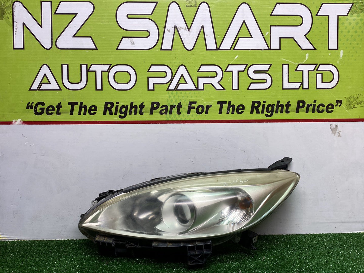 2012 Mazda Premacy CWEFW - Left Headlight PN: See photos