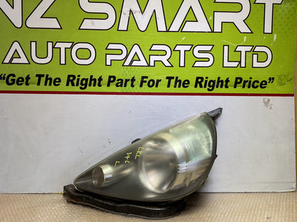 2005 Honda Fit - Left Headlight PN: see photos