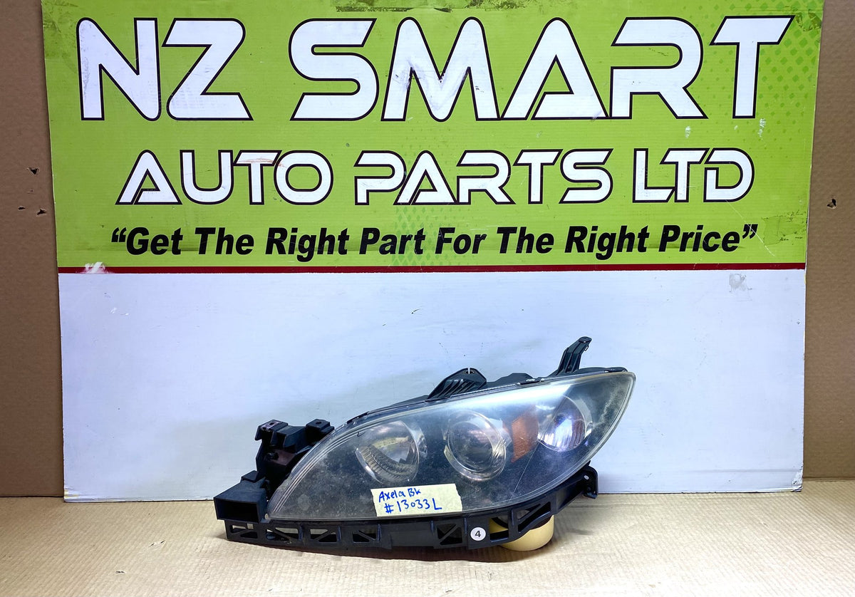 2006 Mazda Axela BK - Left Headlight Manual Adjust/ Non Hid/ P2690