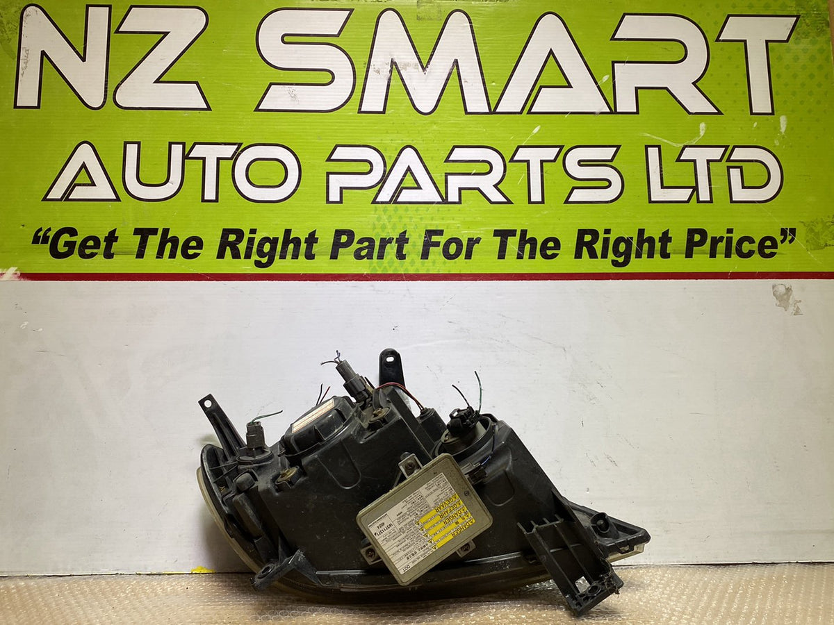 2004 Mazda Demio- Left Headlight PN: D39151041