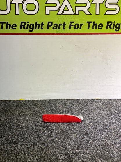 2006 Mazda Axela - Left Rear Bumper Reflector PN: STANLEY P2491 B