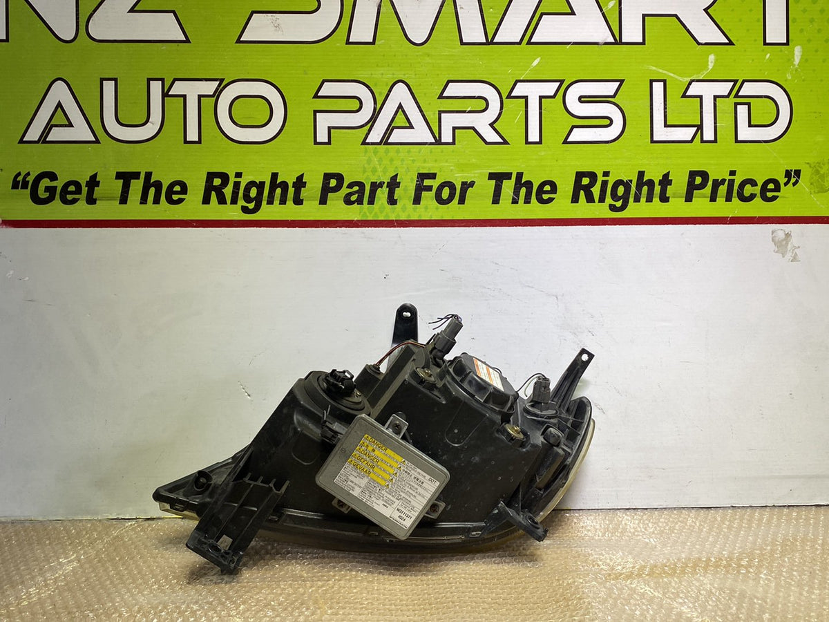 2004 Mazda Demio- Right Headlight PN: D39151031