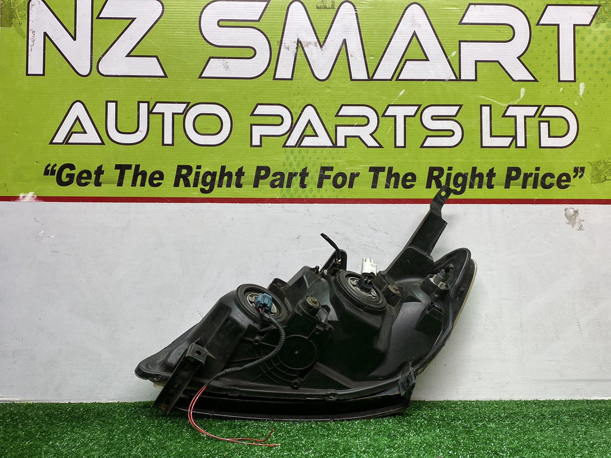 2004 Honda Civic - Right Headlight PN: STANLEY 8519806800