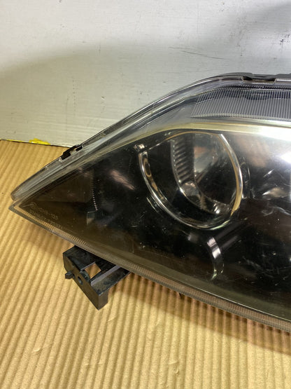 2005 Mazda Demio- Left Headlight PN: STANLEY P2632