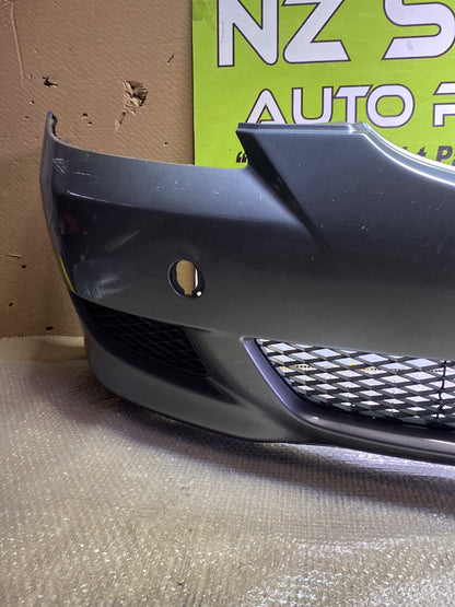 2005 Mazda Axela- Front Bumper PN: see photos