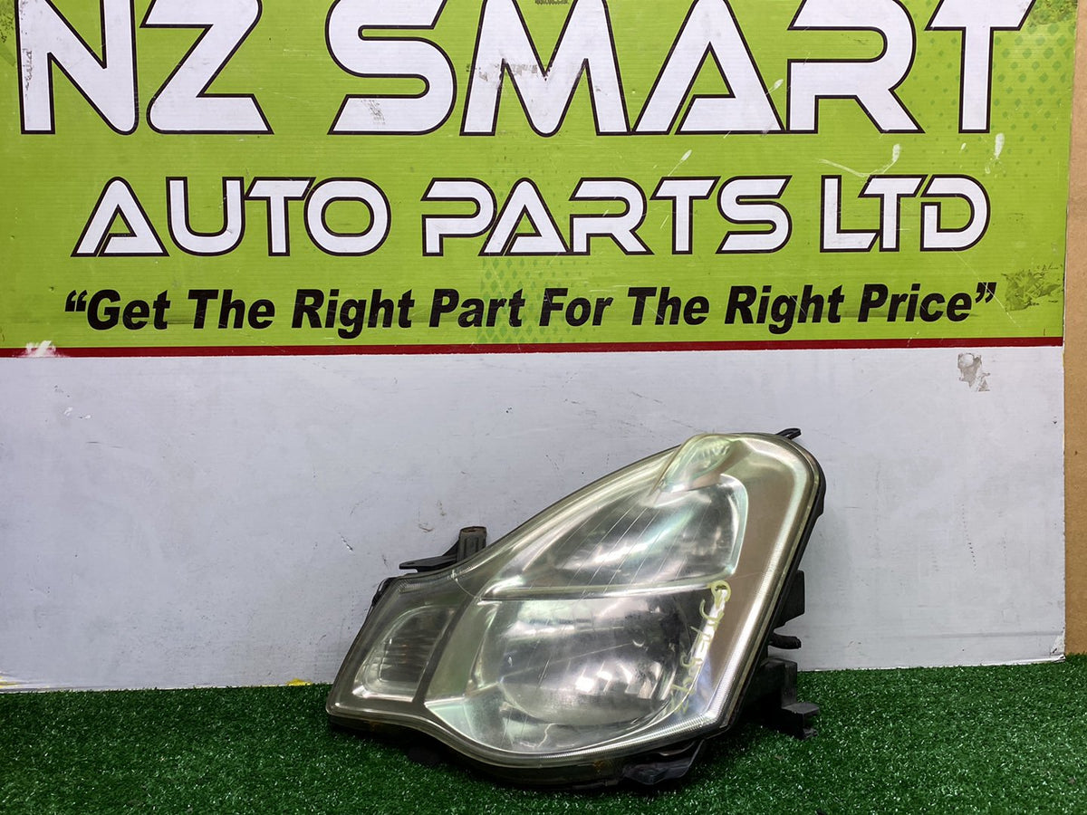 2005 Nissan Bluebird - Left Headlight PN: Auto Adjust/ Non Hid/ KOITO 100-63823