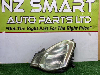 2005 Nissan Bluebird - Left Headlight PN: Auto Adjust/ Non Hid/ KOITO 100-63823
