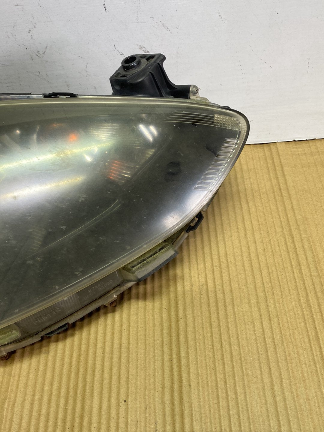2009 Mazda Demio- Right Headlight PN: STANLEY P654/P7217