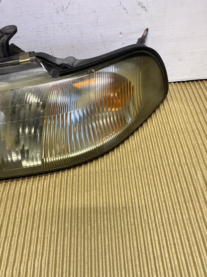 1997 Subaru Legacy- Left Headlight PN: see photos