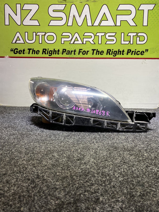 2004 Mazda Axela - Left Headlight Manual Adjust/ Non Hid/ Stanley P2951