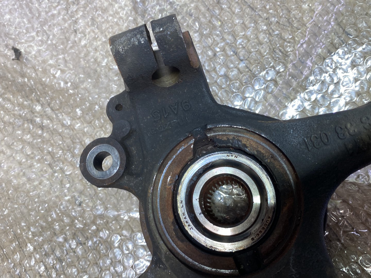 2006 Mazda Axela- Left Front Steering Knuckle PN: BR5S-38-031