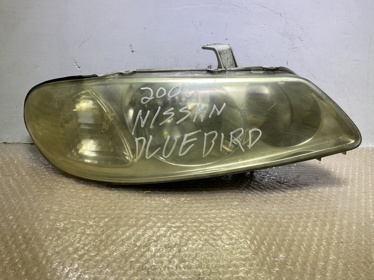 2004 Nissan Bluebird - Right Headlight PN: Manual Adjust/ Non Hid/ ICHIKOH 1723