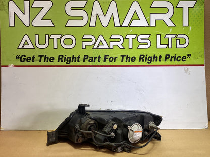 2006 Honda Odyssey- Right Headlight PN: