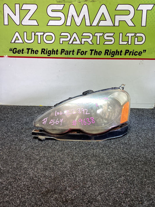 2004 Honda Integra- Left Headlight PN: 100-22392