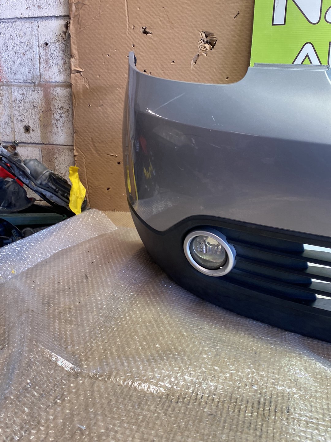 2005 Mazda Verisa- Front Bumper PN: D461-5003L