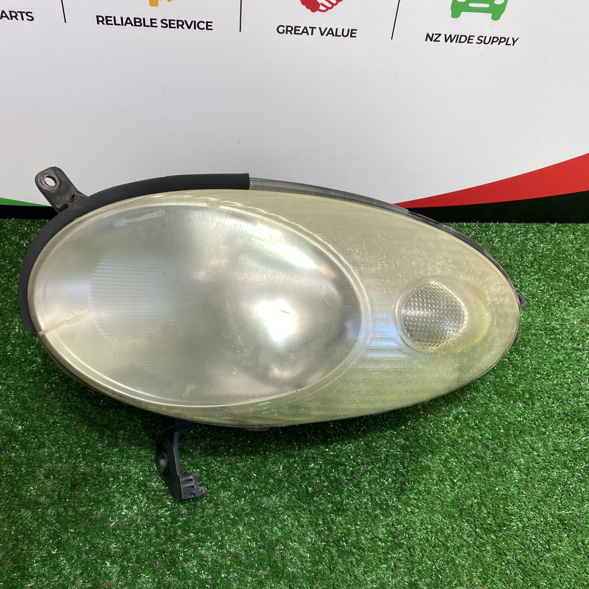2004 Nissan March - Left Headlight PN: ICHIKOH 1704